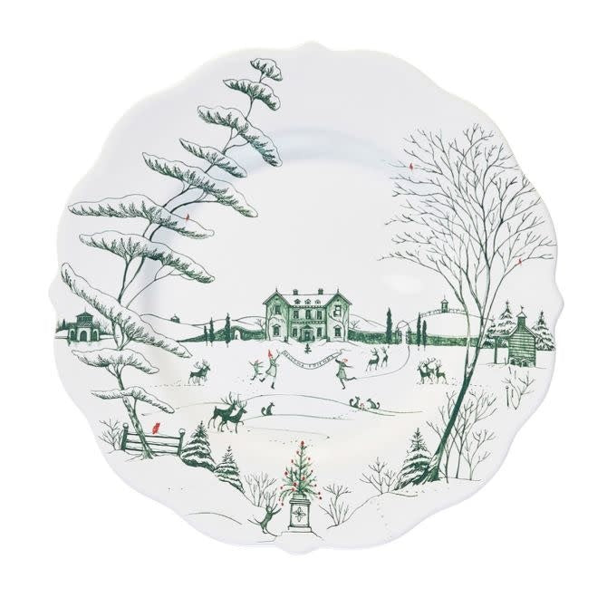Ceramic dinner plate with an evergreen winter frolic country estate scene pattern.