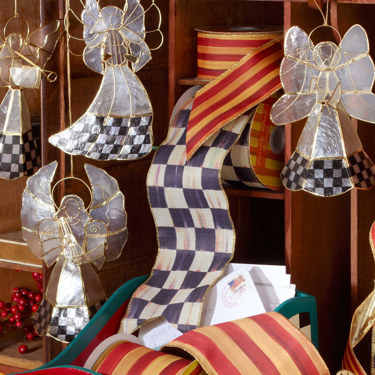 4-inch Courtly Check ribbon in poly fabric with a classic checkered pattern.