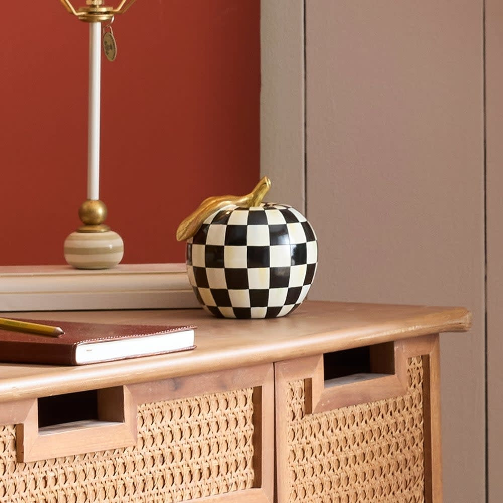 Hand-painted resin apple decor with gold leaf accents in a courtly check pattern.