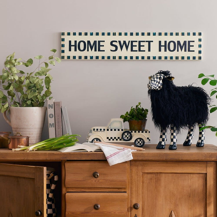Small Courtly Check Black Sheep resin wall art featuring a whimsical black sheep silhouette with checkered patterns.