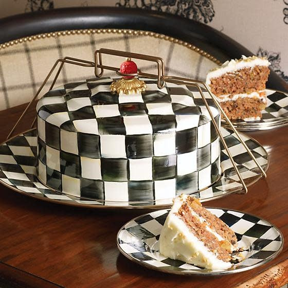 Courtly Check enamel cake carrier with bronze handle; dome lid features hand-painted blue and white checkered pattern.