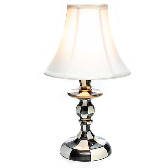 Courtly Check candlestick lamp with hand-glazed steel base in checkered pattern and softback shade.