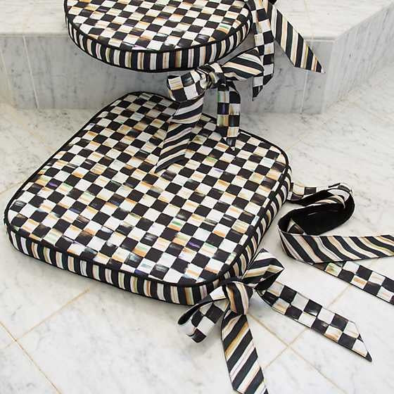 Courtly Check chair cushion in cotton canvas with striped checks and matching ties.