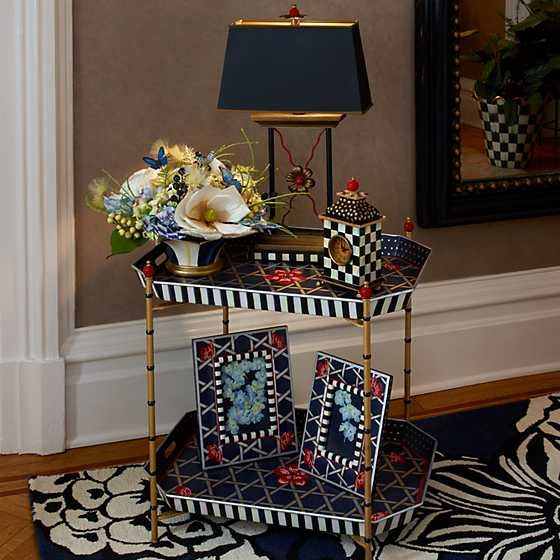 Hand-painted wood desk clock with brass accents featuring black-and-white check pattern and gold polka dots.