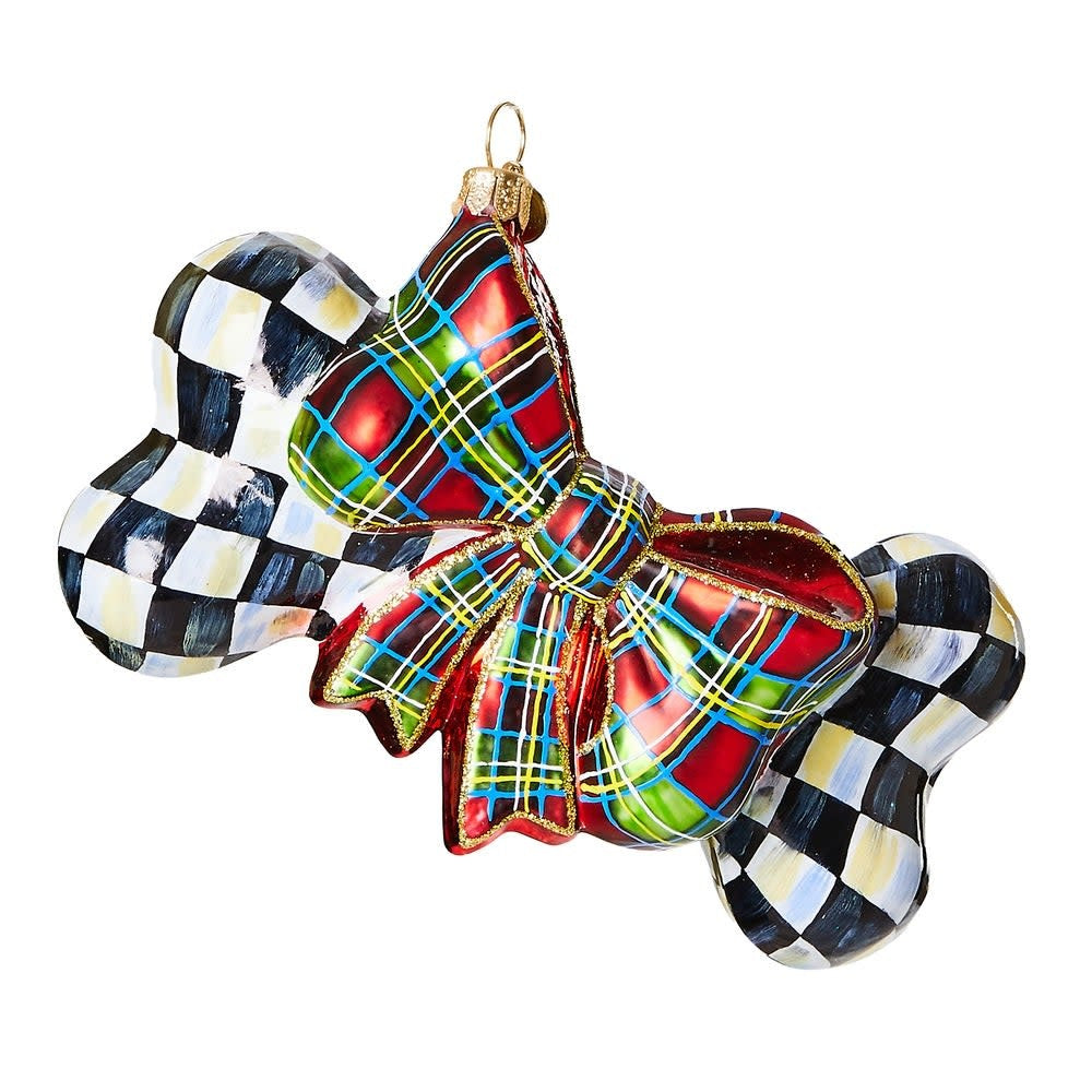 Mouth-blown glass dog bone ornament with courtly check pattern in blue and white.