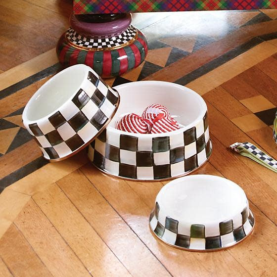 Small Courtly Check pet dish with hand-painted blue check pattern on steel body and bronzed stainless rim.