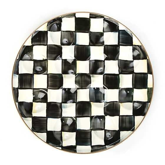 Courtly Check enamel egg plate with hand-painted blue floral pattern on steel rimmed in bronzed stainless steel.