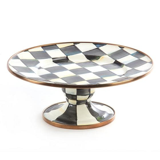 Mini pedestal platter in courtly check ceramic glaze with bronzed stainless steel rim and heavy-gauge steel base.