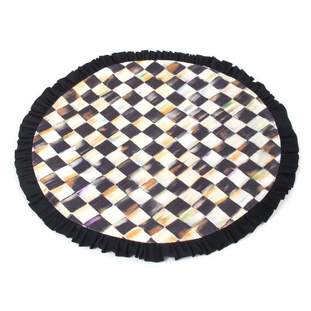 Round Courtly Check cotton placemat with black ruffled edge trim.