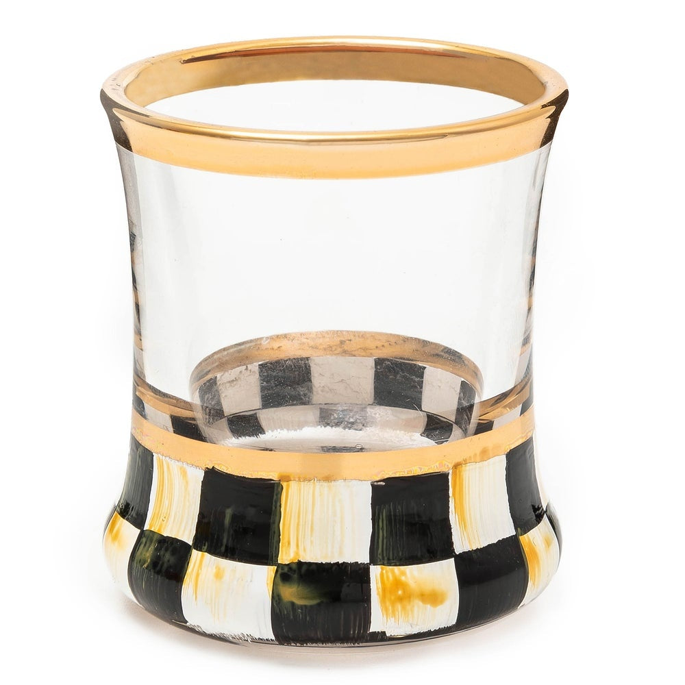 Hand-painted check shot glass with gold lustre trim on a blue base