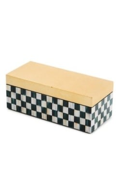 Small rectangular lacquer box with hinged lid featuring a courtly check pattern in black and gold.