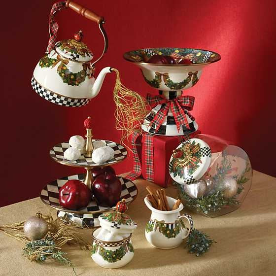 Two-tier enamel sweet stand with Courtly Check blue-and-white pattern on bronzed steel rim and carved knob.