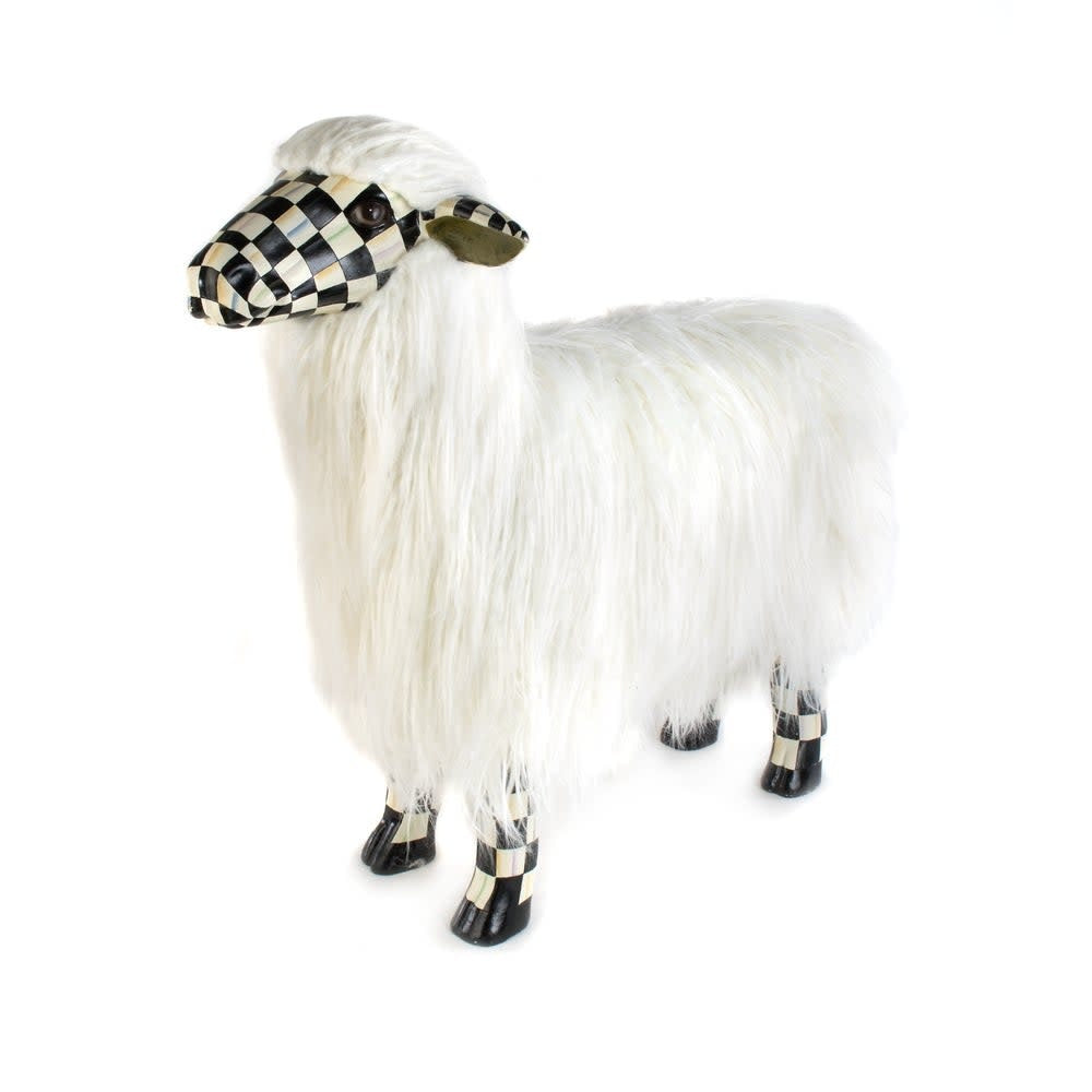 Large white resin sheep figurine with a black courtly check pattern on its body and legs.