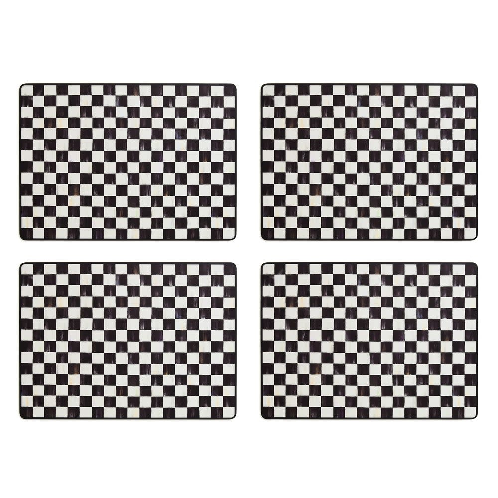 Set of four black and white checked MDF placemats with cork backing.