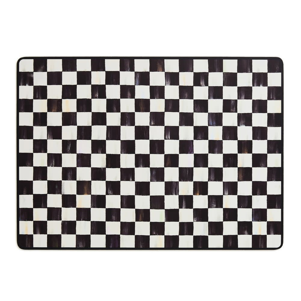 Set of four black and white courtly checked MDF placemats with cork backing.