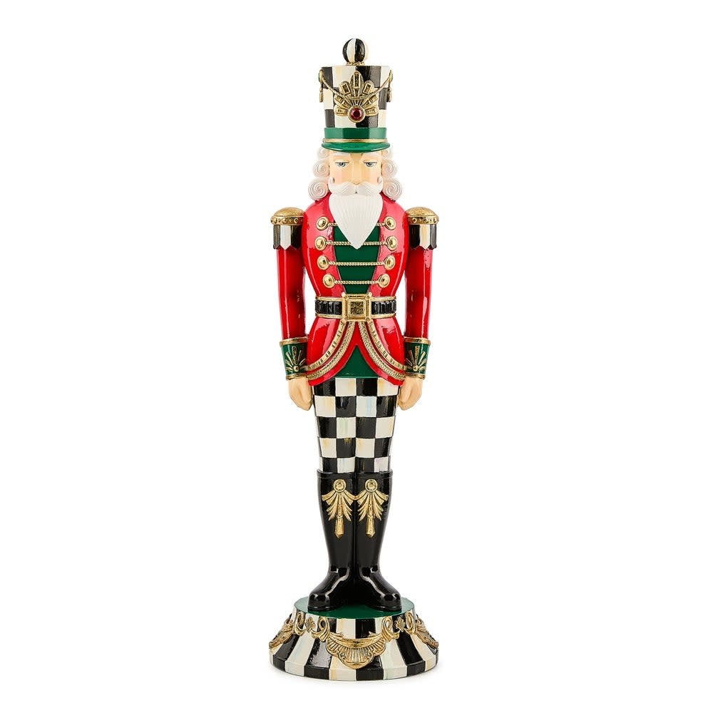 Tall red resin nutcracker with Courtly Check accents standing upright.