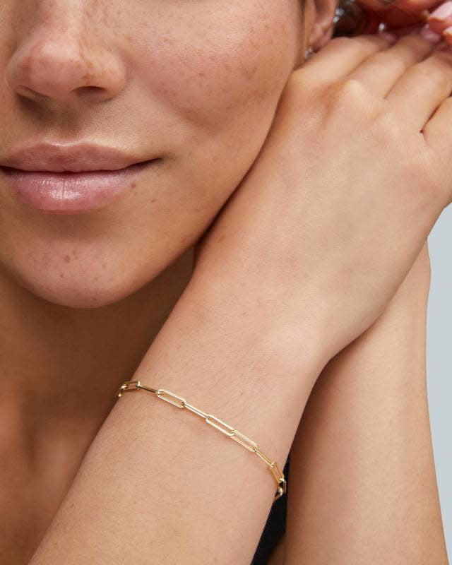 Gold metal paperclip bracelet with lobster clasp closure