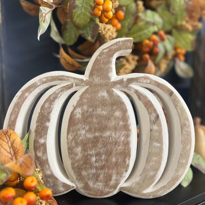 6-inch whitewashed ceramic pumpkin sitter with a matte finish