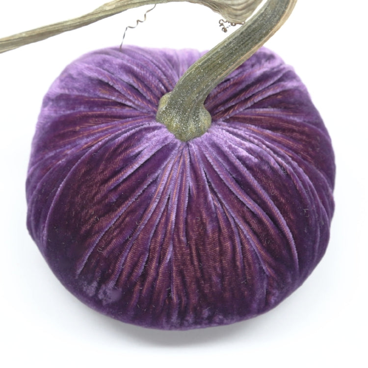 3-inch velvet pumpkin in deep orange with a subtle ribbed texture.