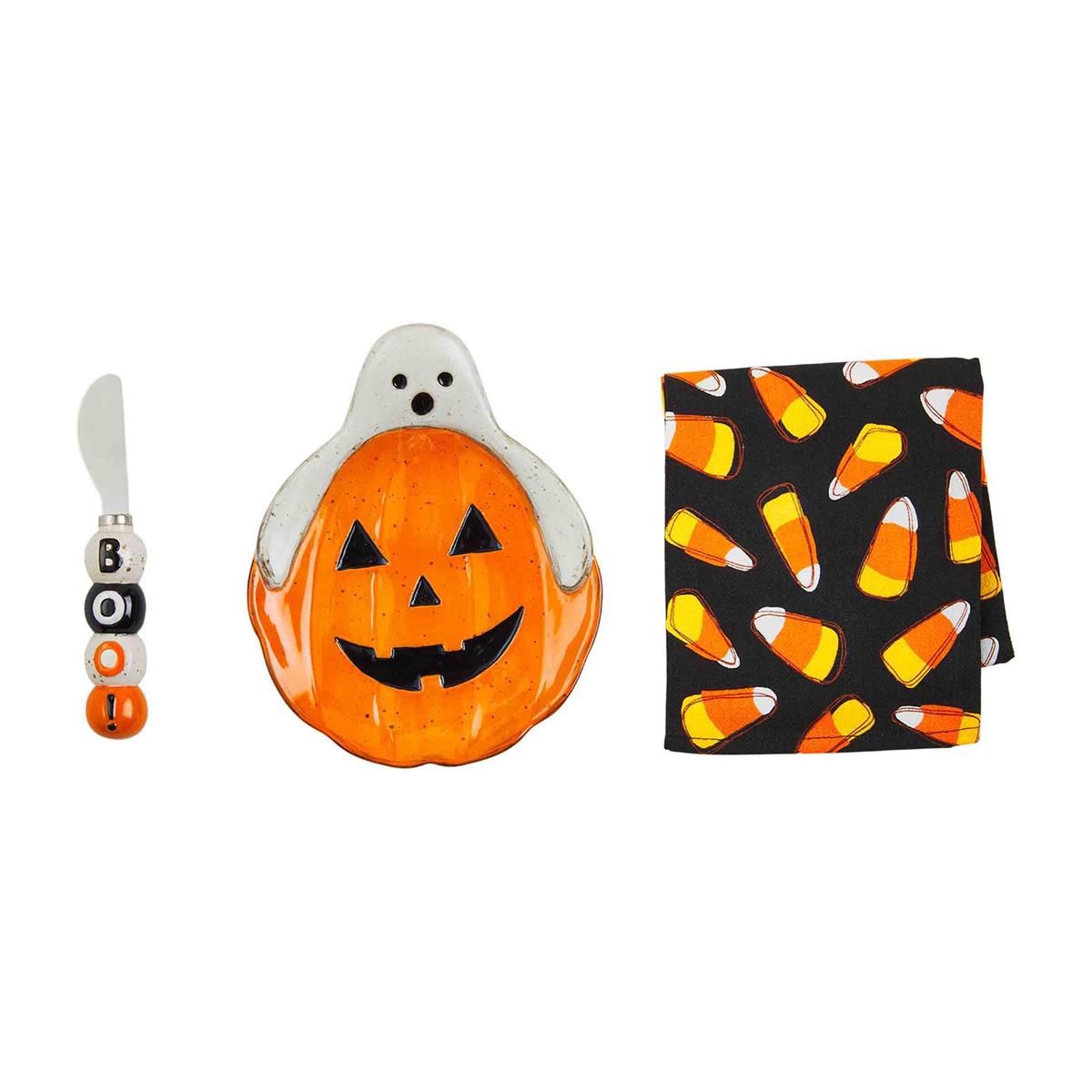 White stoneware Halloween appetizer set with plate, spreader, and towel.