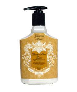 A white bottle of Luxury Hand Lotion with a black pump dispenser and a gold and white label.