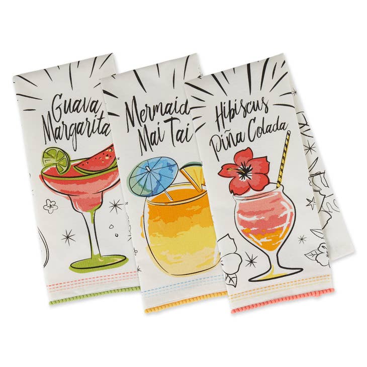 Tropical Sips recipe embellished dishtowels featuring colorful fruit patterns on a white fabric background.