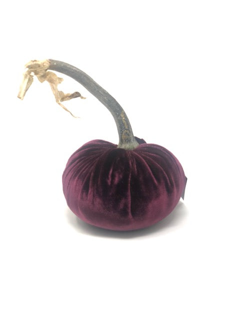 Handmade orange velvet pumpkin with a natural stem.