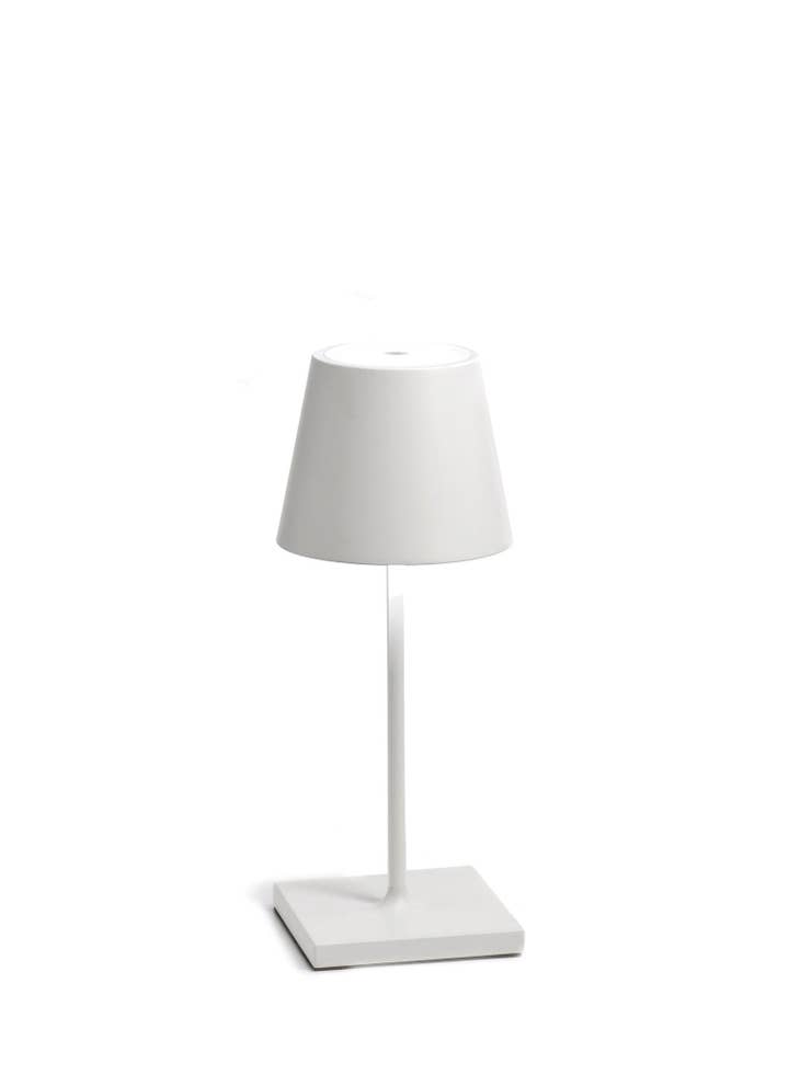 White die-cast aluminum cordless table lamp with square base and polycarbonate diffuser.