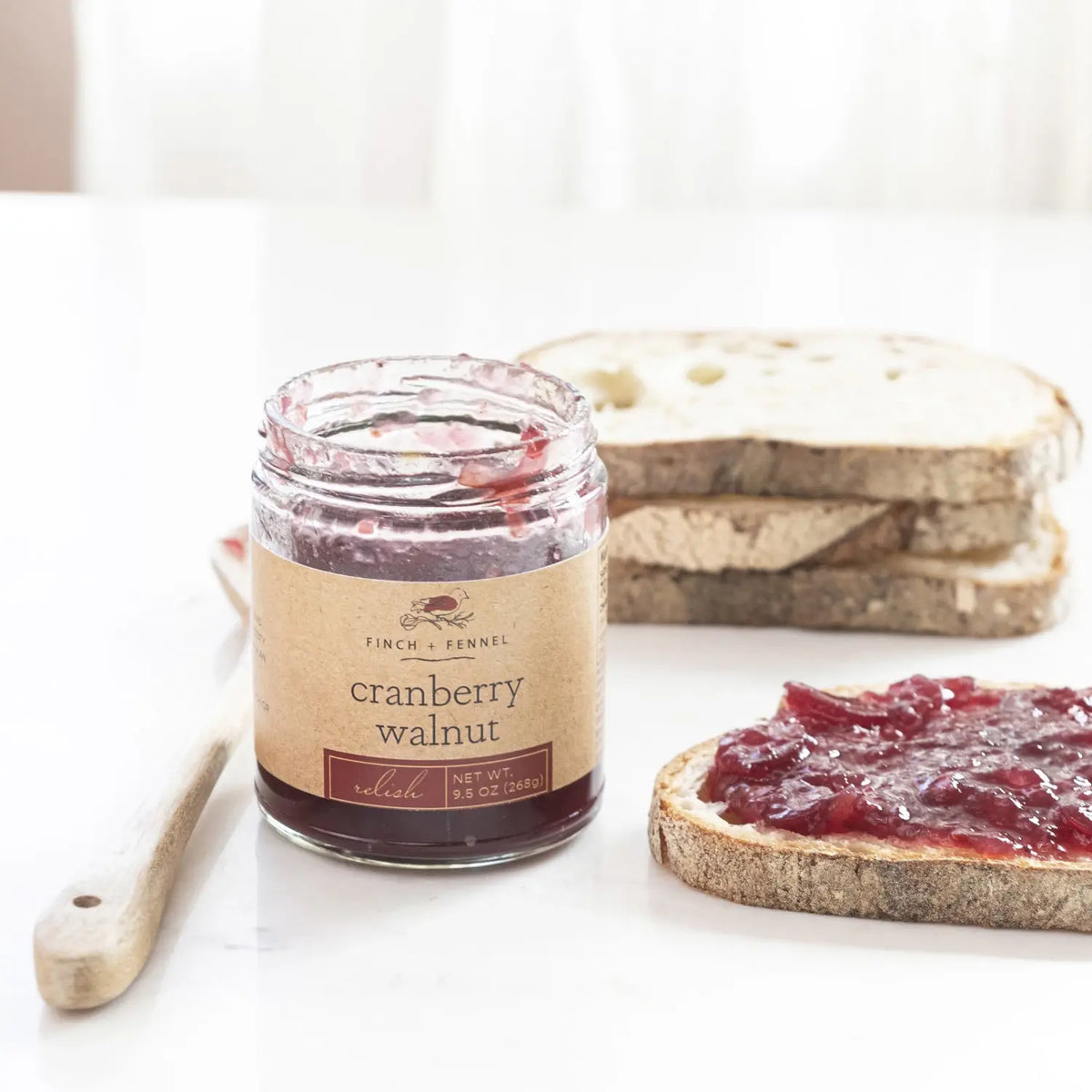 Jar of cranberry walnut relish with orange zest
