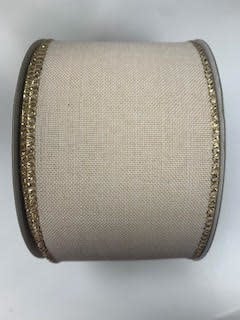 A roll of cream-colored fabric ribbon with metallic gold glitter edges.