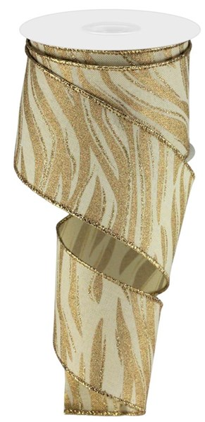 2.5-inch wide cream and gold glitter leopard print ribbon on a spool.