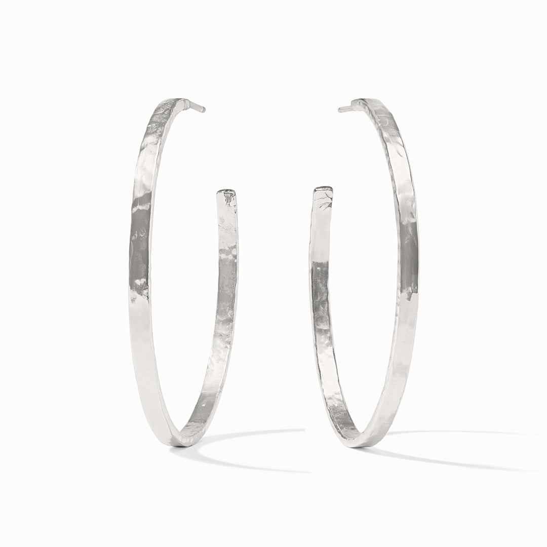 Silver plated crescent hoop earring with a lightly hammered texture.