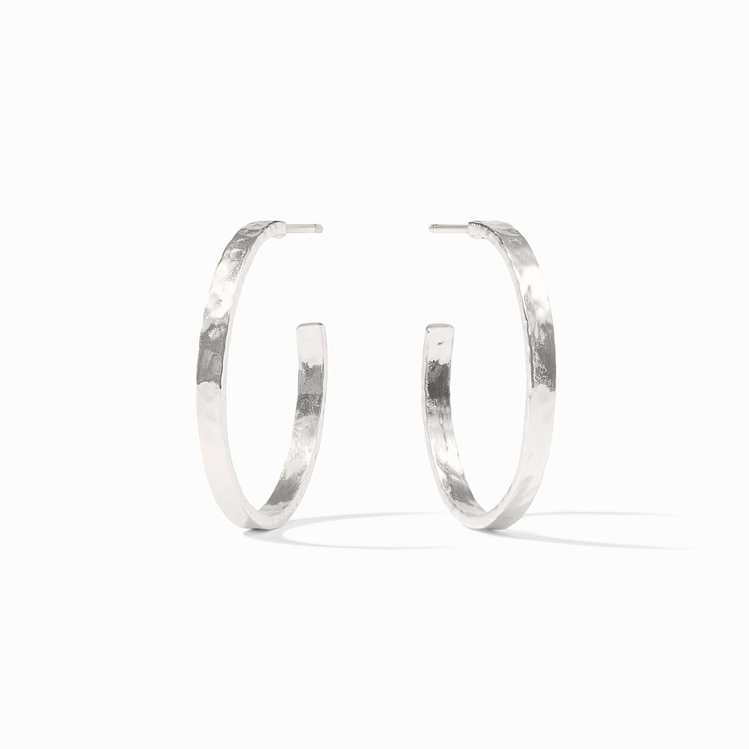 Silver plated crescent hoop earring with a lightly hammered texture.