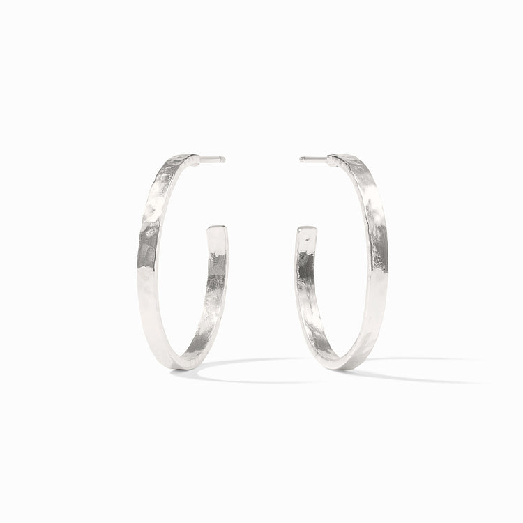 Silver plated crescent hoop earring with a lightly hammered texture.