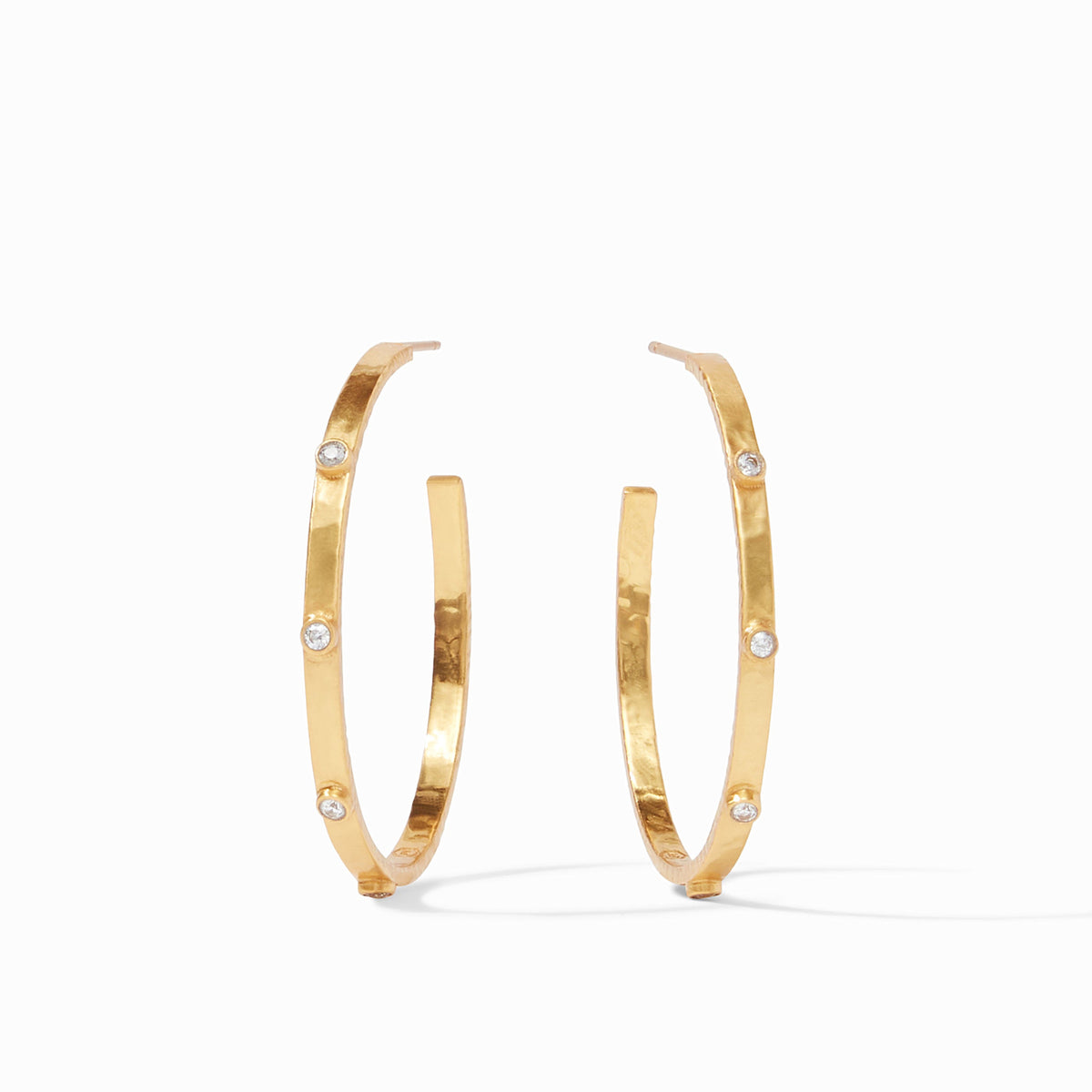 Lightly hammered gold hoop earring with gemstone accents