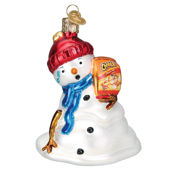 Glass snowman ornament wearing a red hat and blue scarf, holding a bag of Flamin' Hot Cheetos.
