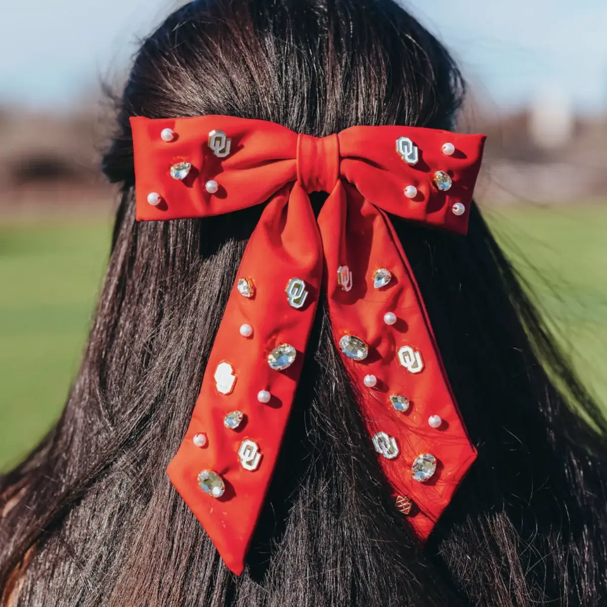 Crimson barrette with University of Arkansas gold logo charms and hand-sewn resin pearls.
