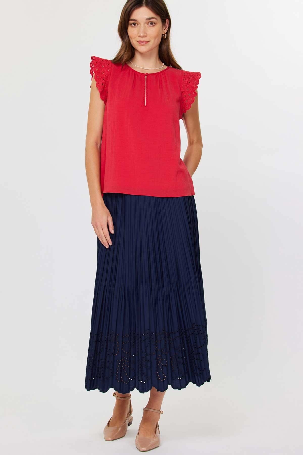 Red round-neck crochet blouse with short sleeves, front buttons, and a neck stitch detail.
