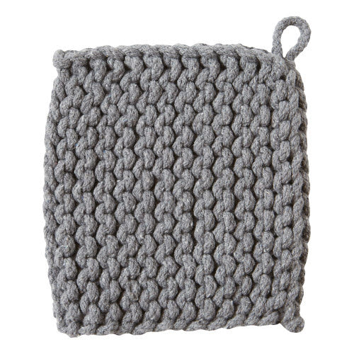 Gray cotton crochet trivet with a textured openwork circular shape.