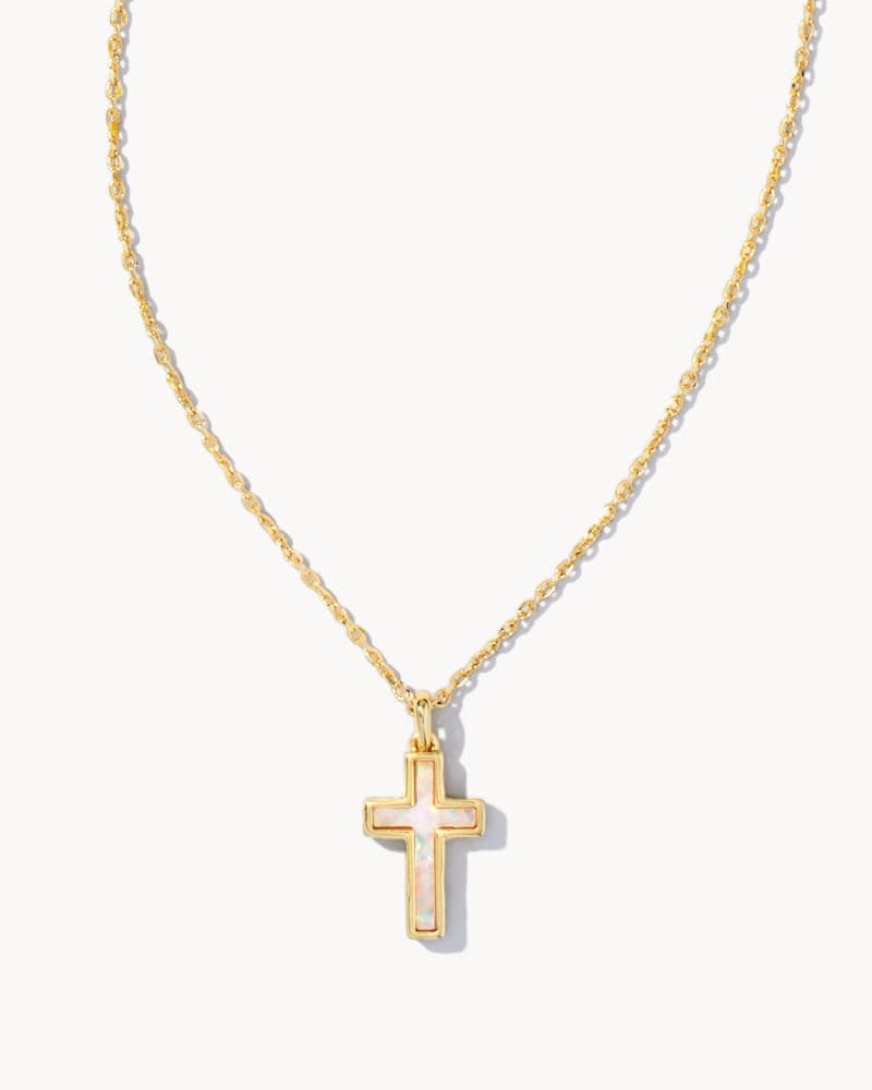 Gold cross pendant necklace featuring a white Kyocera opal stone on an 18-inch chain.