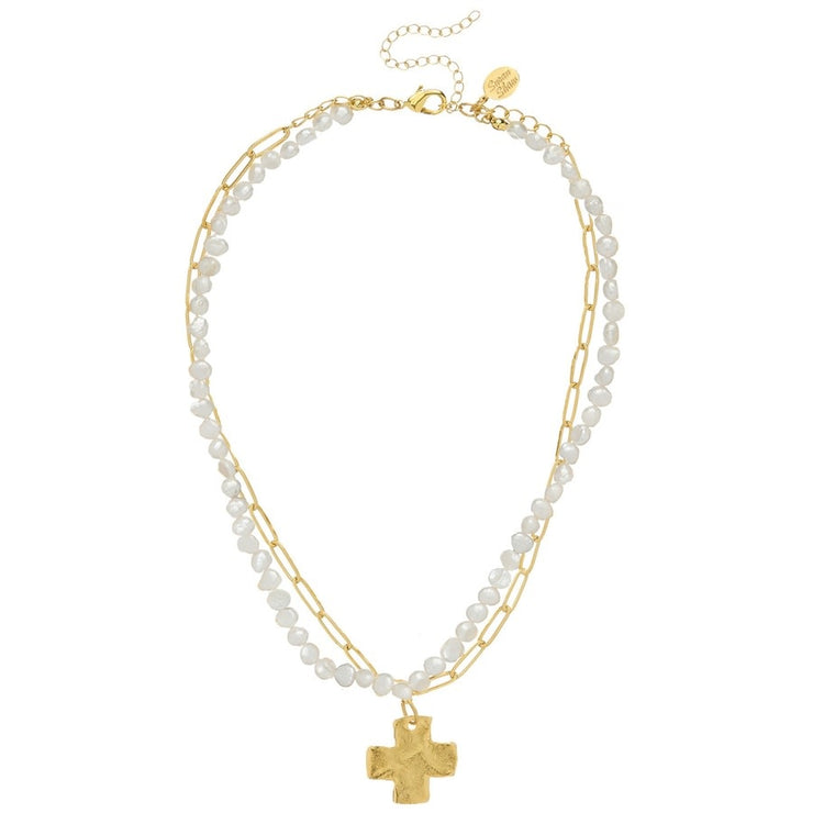Dainty double-strand necklace with freshwater pearls, paperclip chain, and cross pendant in silver tone.