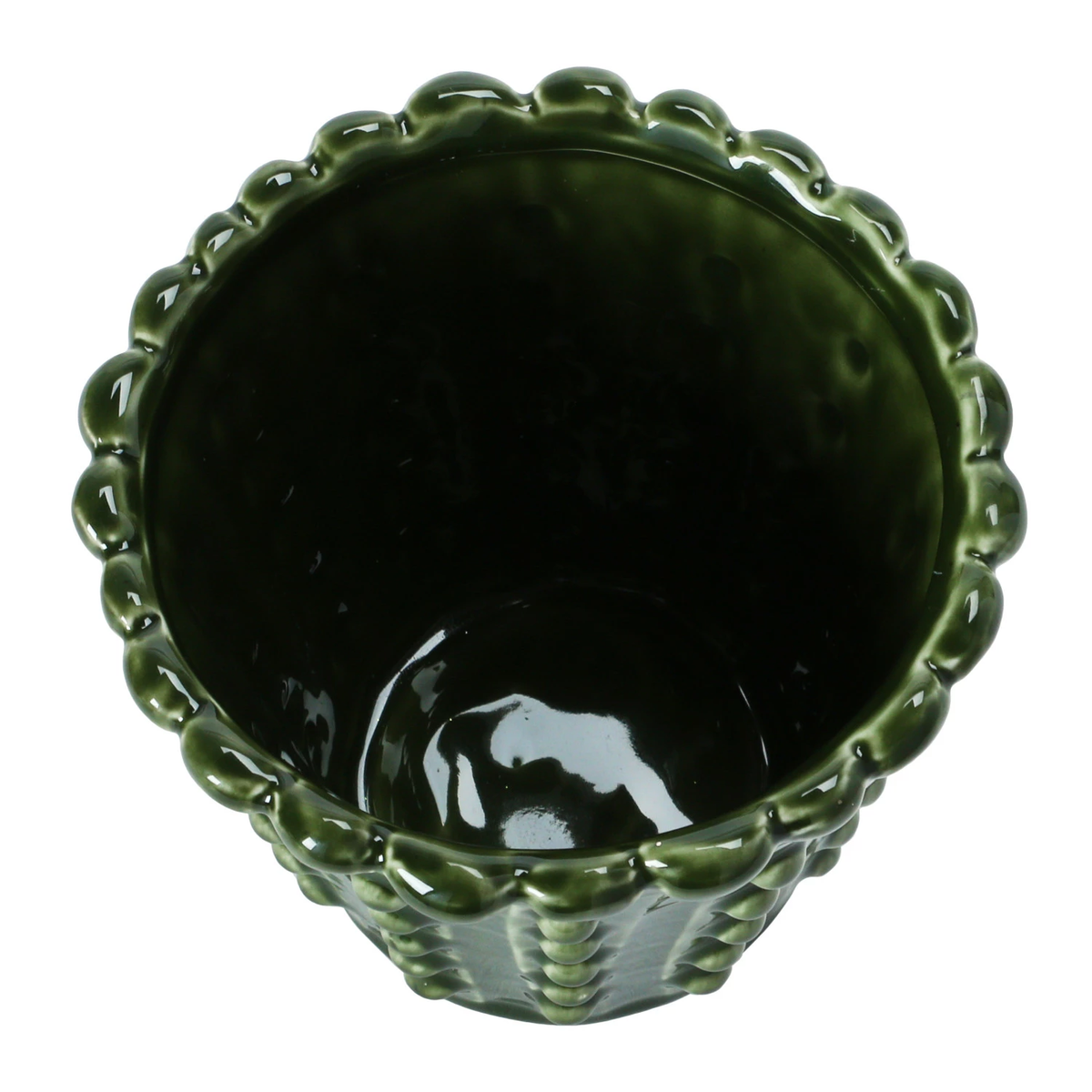 Round green stoneware hobnail planter with solid bottom holding a small succulent.