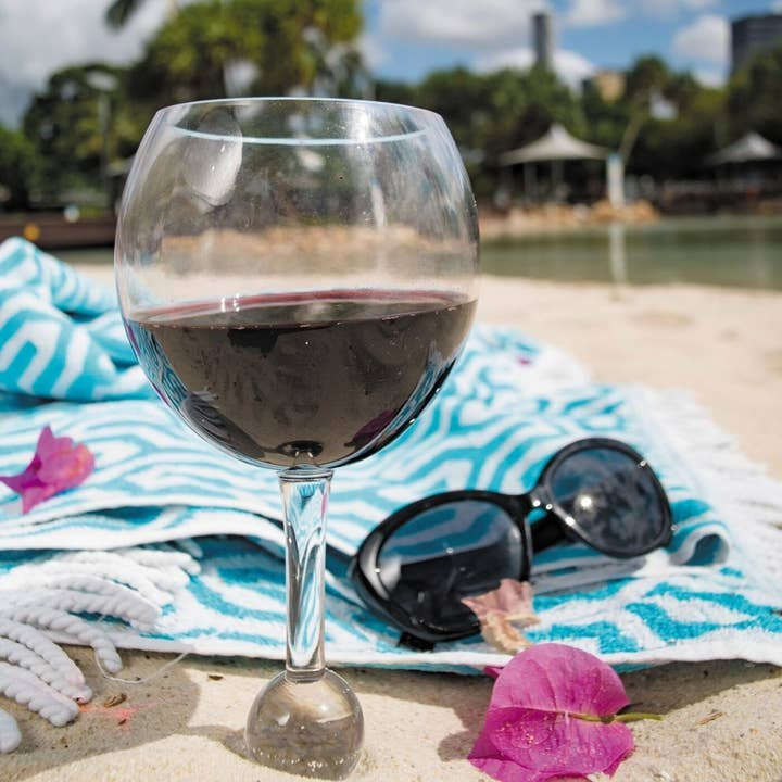 Clear crystal beach glass tumbler with a smooth rim, designed to hold over 12 oz of beverage.