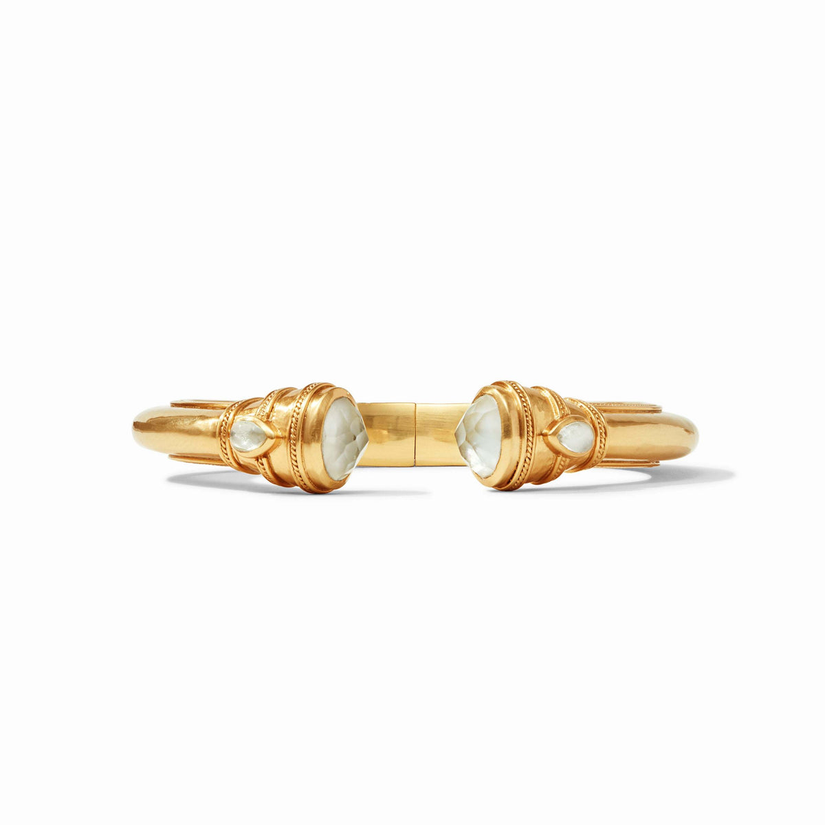 Cannes Demi Cuff in gold with shell pearl endcaps and pear-shaped gemstones.