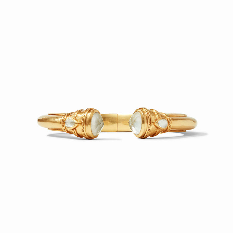 Cannes Demi Cuff in gold with shell pearl endcaps and pear-shaped gemstones.