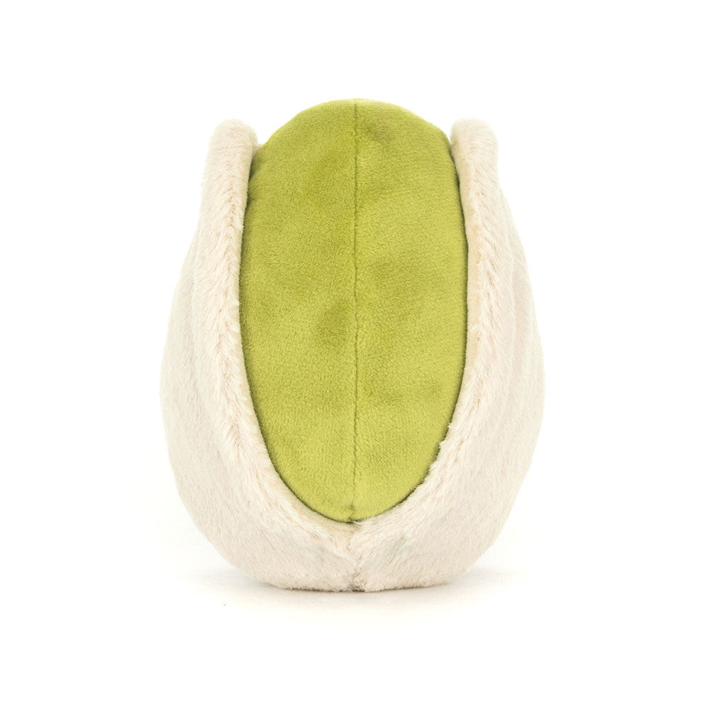 Back view of Amuseables Horatio Pistachio plush toy showing a green nut inside a beige shell.