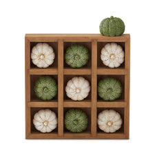 7-inch wooden tic-tac-toe board with nine green and cream fabric pumpkins in a grid.