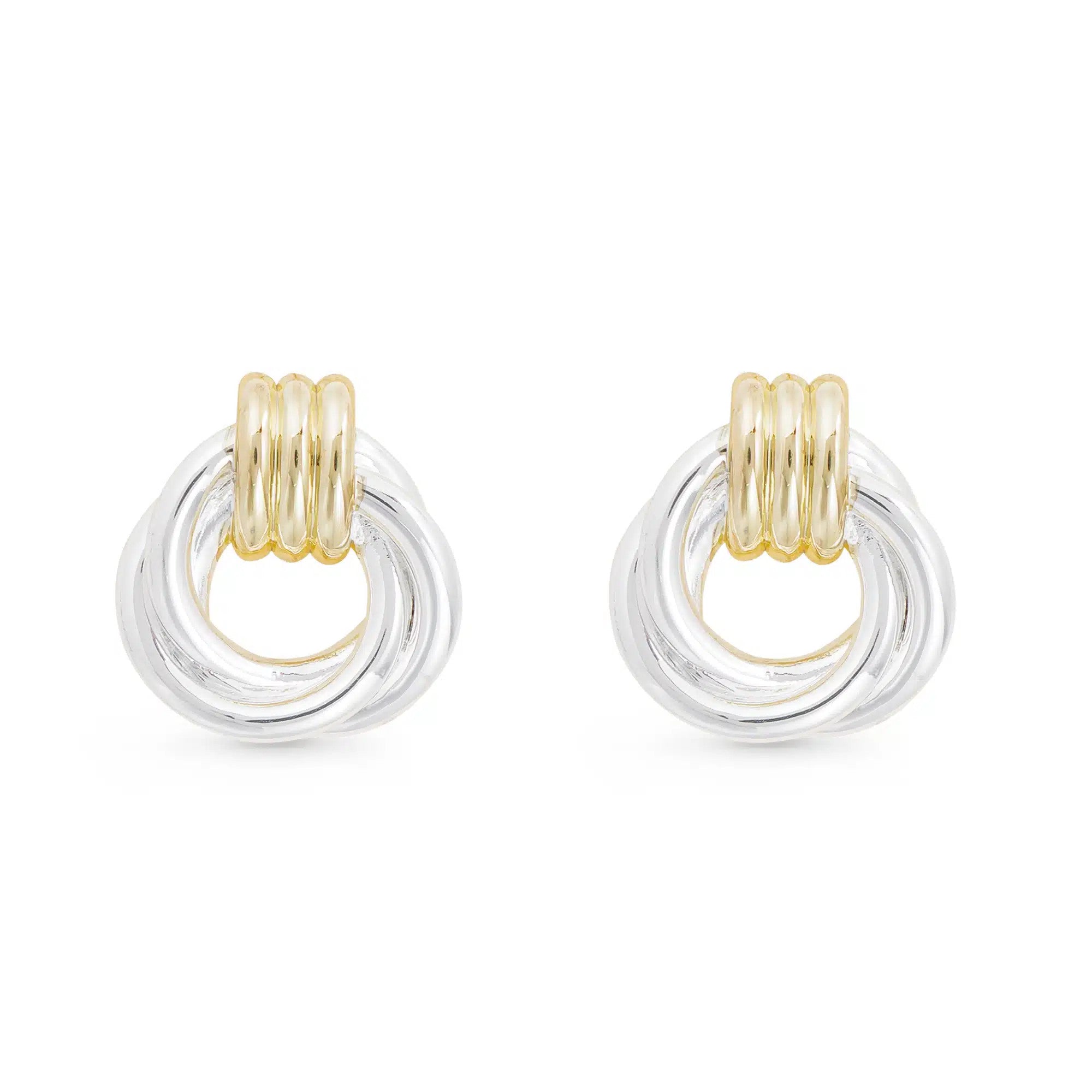 Two-tone polished twist knot earrings featuring intertwined silver rings and a gold ribbed clasp.