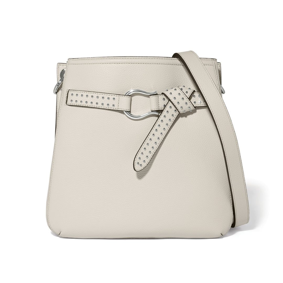 White leather Cade convertible hobo bag with magnetic flap closure.