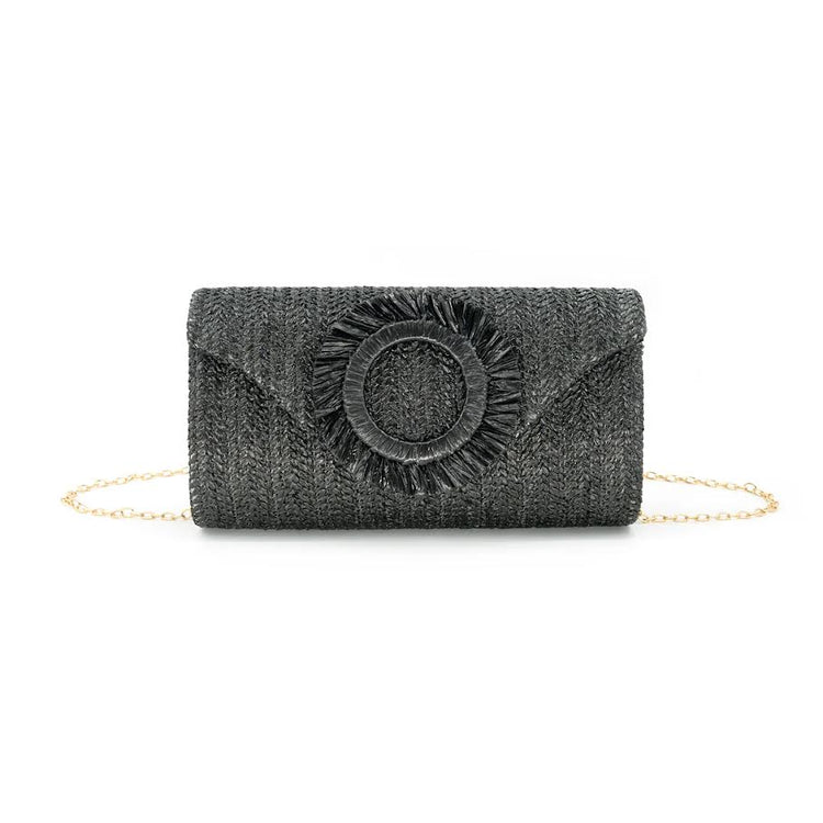 Solea Clutch woven straw handbag in natural color with a rectangular silhouette and open top design.
